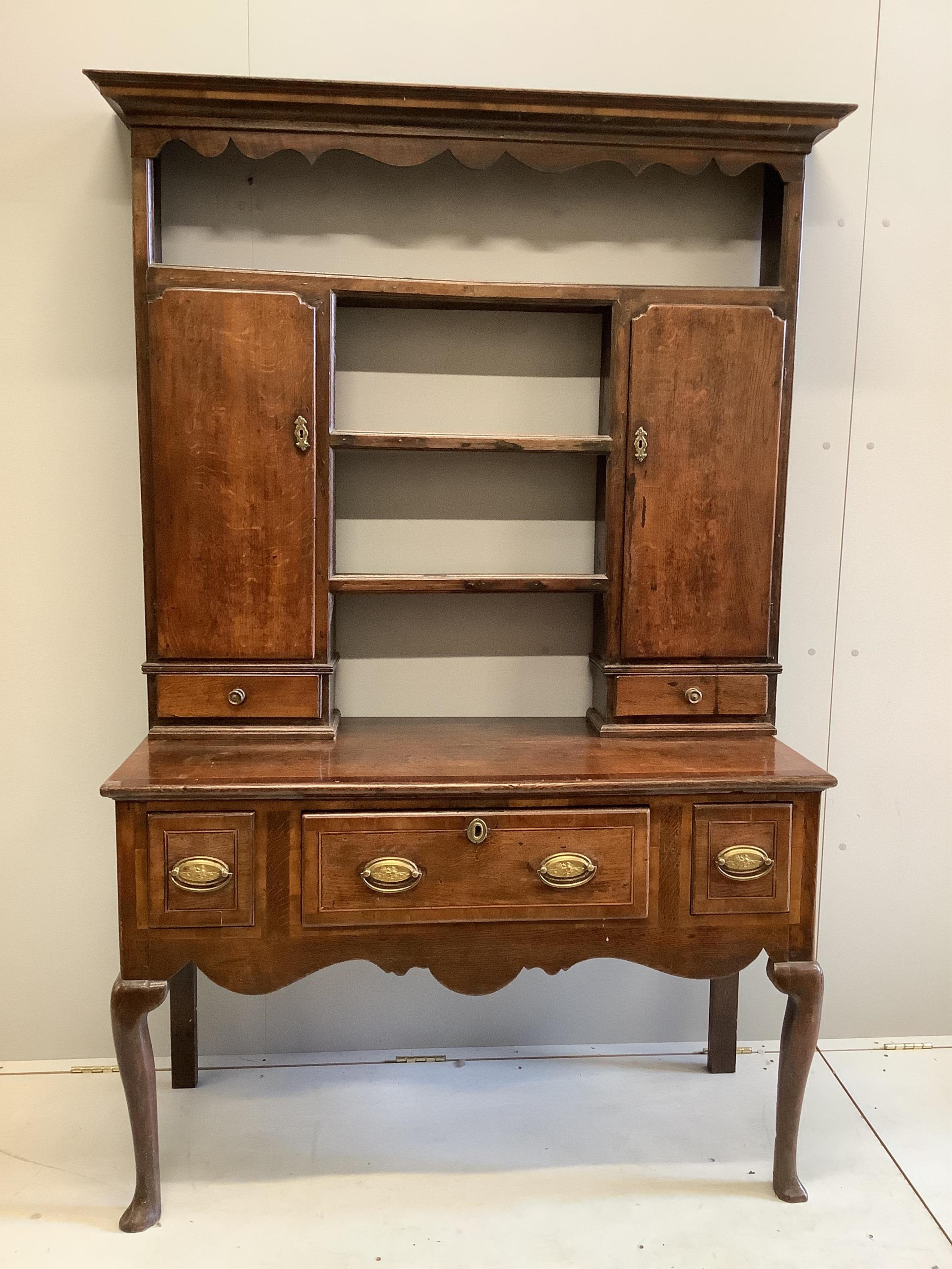 A small George III mahogany banded oak dresser, width 121cm, depth 53cm, height 192cm. Condition - fair